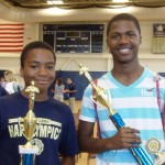 Christopher Augustin (to the left) with his trophy.